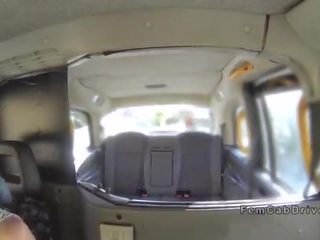 Busty honey in bruises banged with strap on in fake taxi